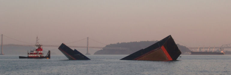 Hopper barge salvage - buckled barge grounded